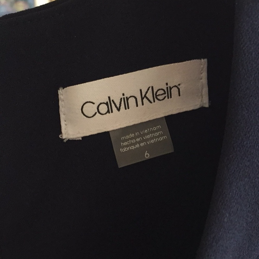 CK size 6 navy sheath. Never worn. Back Zip. New.